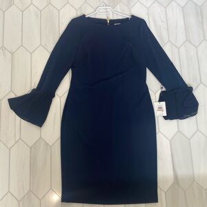 Brand new never been worn navy blue Calvin Klein dress.